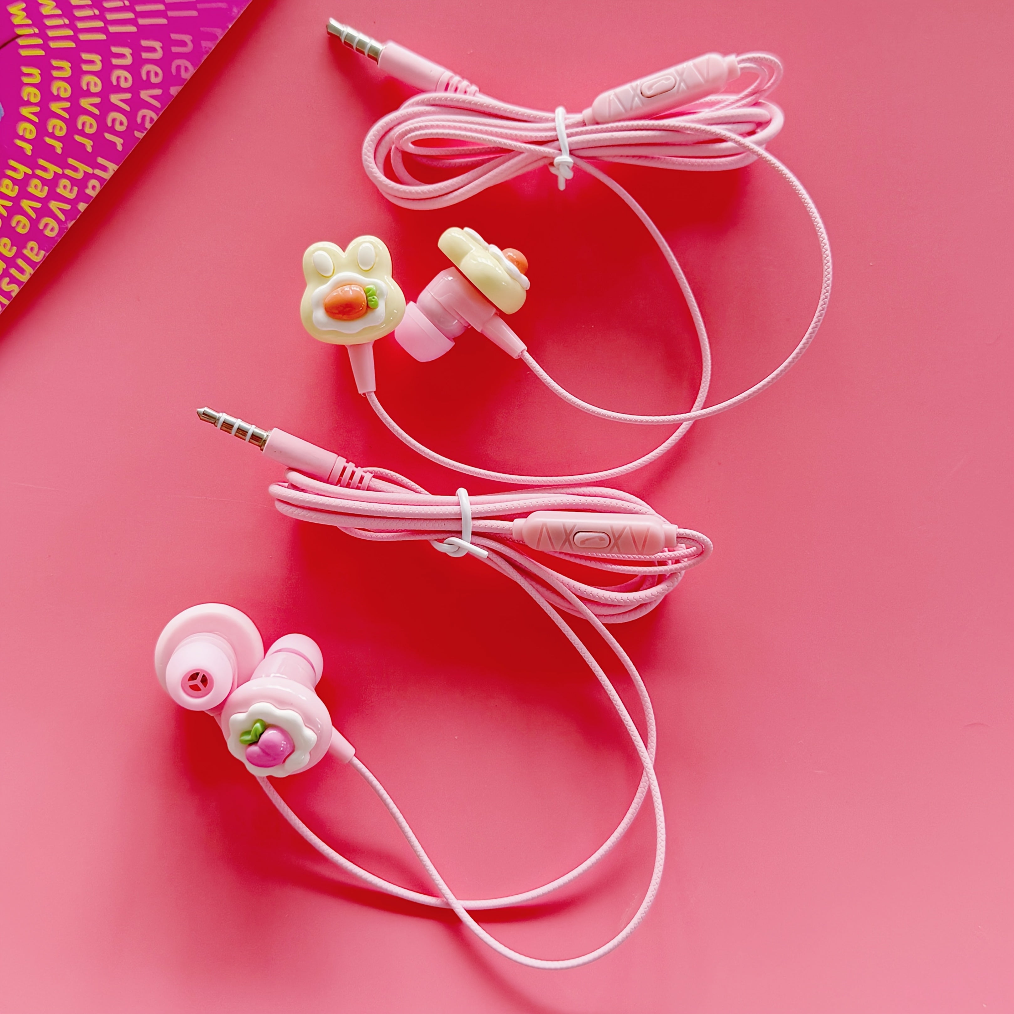 Cute Pink In-Ear Wired Headphones Featuring Cartoon Additions, Equipped with a 3.5MM Plug for Full Compatibility. They Come with a Built-In Microphone for HD Calling And Can Be Directly Plugged Into Any Device with a 3.5Mm Ja