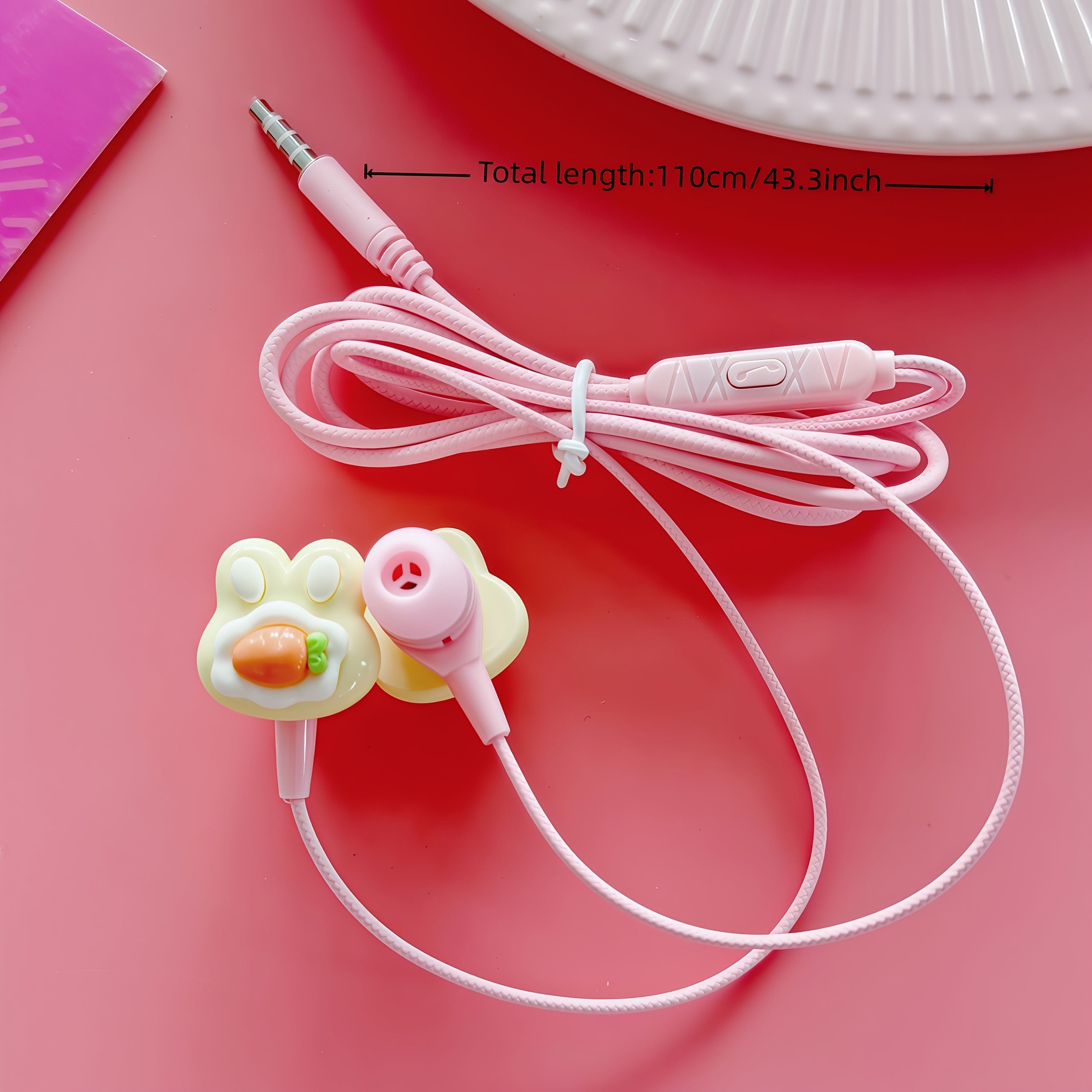 Cute Pink In-Ear Wired Headphones Featuring Cartoon Additions, Equipped with a 3.5MM Plug for Full Compatibility. They Come with a Built-In Microphone for HD Calling And Can Be Directly Plugged Into Any Device with a 3.5Mm Ja
